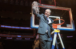 TCU Basketball head coach Jamie Dixon shows off the net he cut after TCU defeated Georgia Tech 88-56 to win the NIT at Madison Square Garden in New York City on March 30, 2017. Photo by Glen E. Ellman
