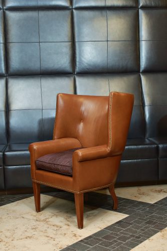 Leather-upholstered chair in the Founder's Club in Amon Carter Stadium, part of the design by TCU in-house interior designer Lisa Aven '79. Photo by Carolyn Cruz