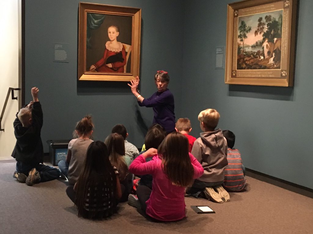 Gallery Teacher Bridget Thomas talks to a group of grade school students in the Amon Carter Museum, Fort Worth. Photo courtesy of Connie Diane McClure (instructor, ARED 40970: Learning in the Art Museum)