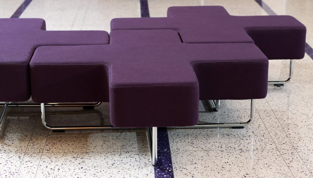 Jaks cross-shaped modular seating, designed by John Coleman for Allermuir. TCU interior designer Stephanie McPeak incorported the distinctive pieces in her design for the atrium of Rees-Jones hall. Photo by Carolyn Cruz