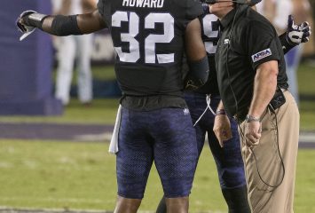 Travin Howard and Coach Gary Patterson discuss a play on the sidelines during TCU's season opener against Jackson State. Photo by Glen E. Ellman