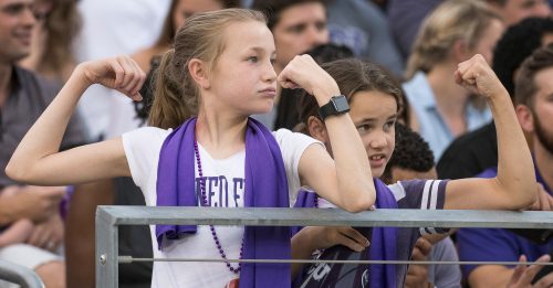 Two children (who were not yet born the last time TCU won at OSU in 1991) root for the Horned Frogs in the season opener against Jackson State. Photo by Glen E. Ellman