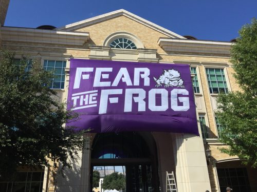 The "Fear the Frog" banner hangs at the west end of TCU's Campus Commons in preparation for ESPN's College GameDay. Photo by John Denton
