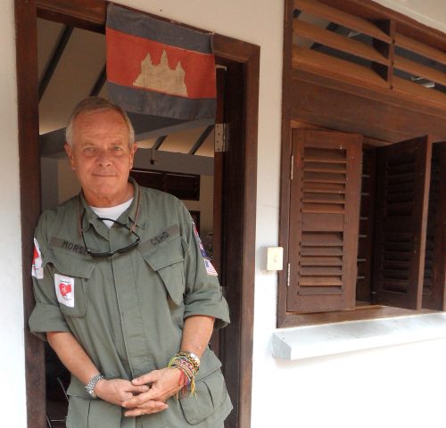 Bill Morse '71, dressed in the fatigues worn by the demining teams of Cambodian Self-Help Demining (CSHD), an organization dedicated to finding and disarming landmines and unexploded ordnance (UXOs) in parts of Cambodia deemed "low priority" by the government's mine-clearing efforts. Photo courtesy of Landmine Relief Fund