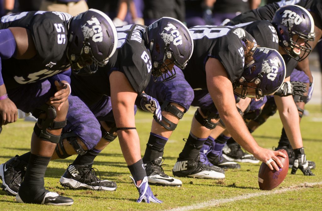 TCU readies for the snap at the line of scrimmage in the November game against Baylor. Photo by Glen E. Ellman