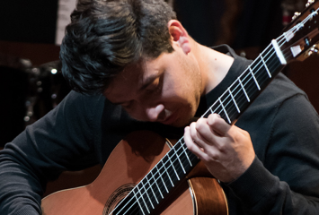 Classical guitarrist Noe Garcia performs during the 11th biennial Latin American Music Festival at PepsiCo Recital Hall. Courtesy of TCU School of Music | Photo by Robert Burn