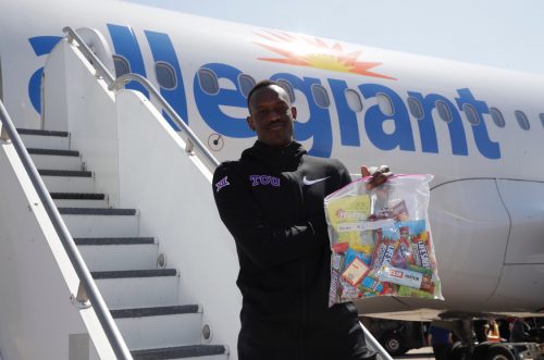 Kouat Noi shows off his snacks for the flight to Detroit. TCU men's basketball plays Friday at 8:40 p.m. CT. Photo courtesy of TCU Athletics.