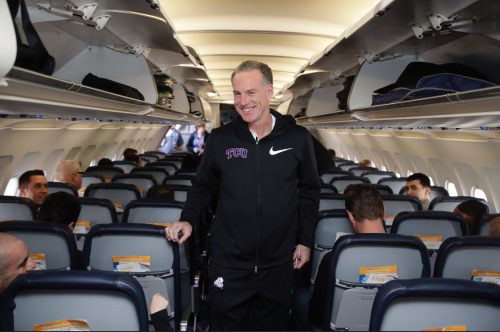 Men's Basketball Head Coach Jamie Dixon boards the plane to Detroit for the first round of the NCAA Tournament. Photo courtesy of TCU Athletics.