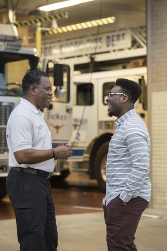 Courtland MacQueenette ’16 learned to play golf from his father, William, a battalion chief with the Fort Worth Fire Department. Photo by Leo Wesson