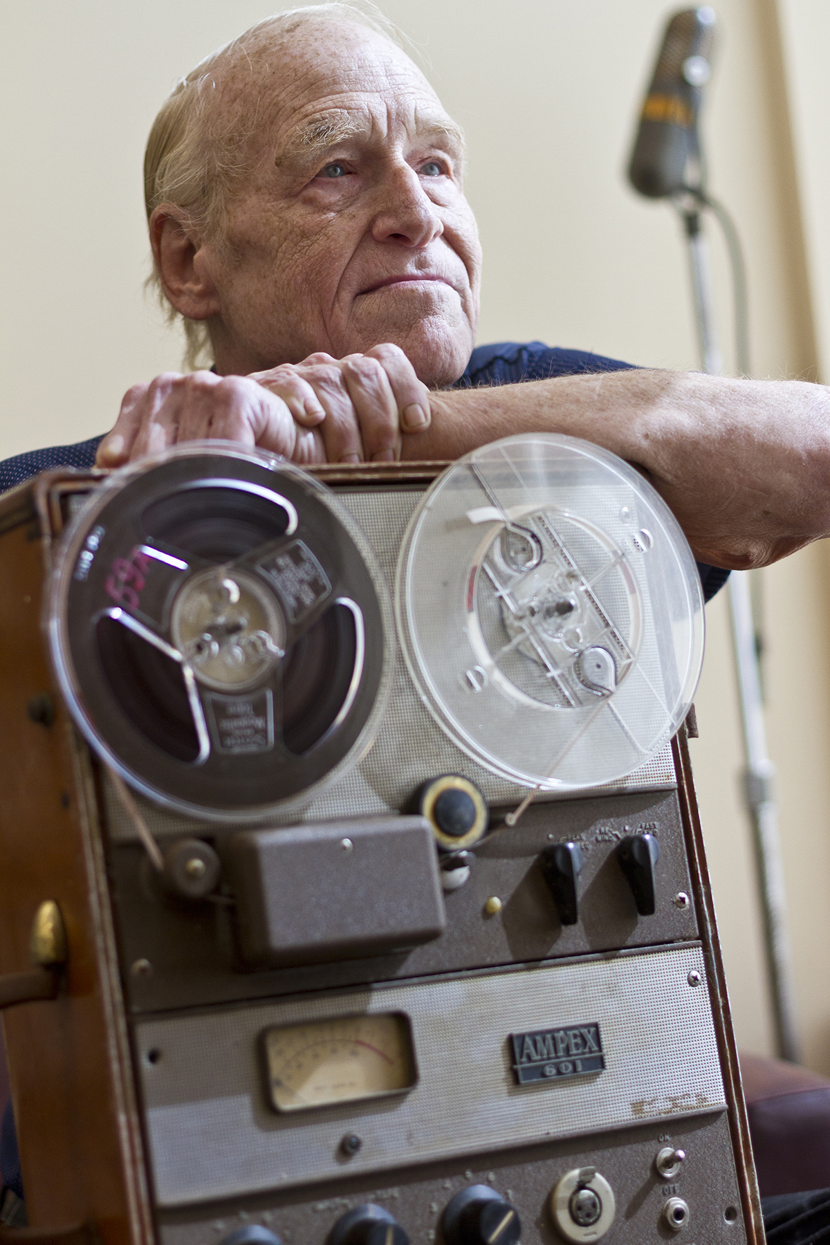TCU alum Barto Farrar with the suitcase sized Ampex reel-to-reel tape recorder he used during his career. At TCU he interviewed celebrities that came through the area for the campus radio station. Photo by Mark Graham