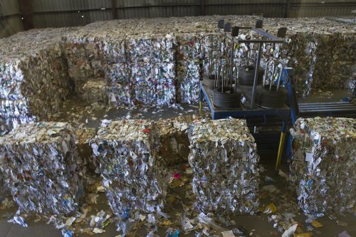 Students saw bundles of waste products at the Republic Services North Texas Recycling Complex in Fort Worth. Photo by Mark Graham