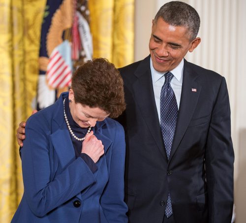 President Barack Obama comforts Tam O’Shaughnessy on Nov. 20, 2013 as she accepts the Presidential Medal of Freedom on behalf of her partner, astronaut Sally K. Ride who died in 2012. NASA Photo / Alamy Stock Photo