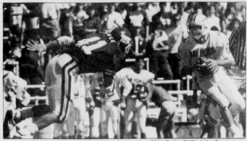 Jason Cauble bears down on Air Force quarterback Dee Dowis before a homecoming crowd of 23,593 in 1989. Photo courtesy of TCU Archives