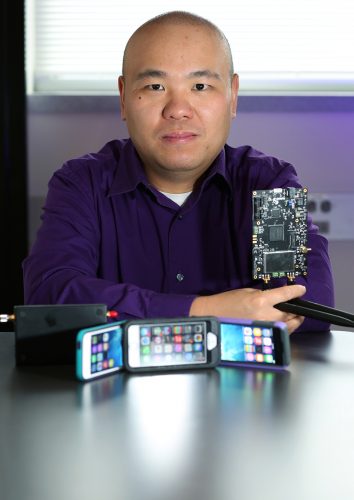 Professor Liran Ma is exploring ways the new technology cognitive radio can be used to improve network speed and bandwidth for wireless devices. Photo by Robert W. Hart