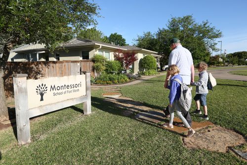 Patrick McCarty walks his children, Nora (left) and Evan, to school. The Montessori School of Fort Worth was founded in 1968 and now educates students in preschool through eighth grade. The Montessori method encourages students to learn at their own pace. Photo by Carolyn Cruz
