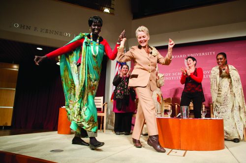 South Sudanese Cabinet member Rebecca Joshua Okwaci danced with Swanee Hunt at the JFK Forum at Harvard University’s John F. Kennedy School of Government in 2012. As the founding director of the school’s Women and Public Policy Program, Hunt invited women leaders from around the globe to speak at the university. Courtesy of Swanee Hunt