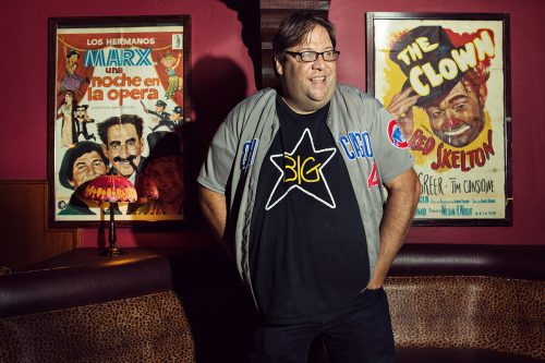 Los Angeles area arts editor and film critic Carl Kozlowski '93, photographed in the VIP Room of the iconic Hollywood Laugh Factory where he regularly performs stand-up comedy. Photo by Christine Gandolfo