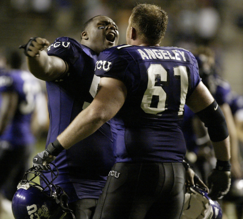 Zarnell Fitch (left) embraces #61 Ben Angeley after TCU defeated Utah in 2005. Courtesy of TCU Athletics