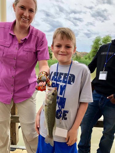 Dr. Alison Lunsford holds a fish Taygen caught at camp in 2018. Photo courtesy of Alison Lunsford/Diabetes Foundation of the High Plains