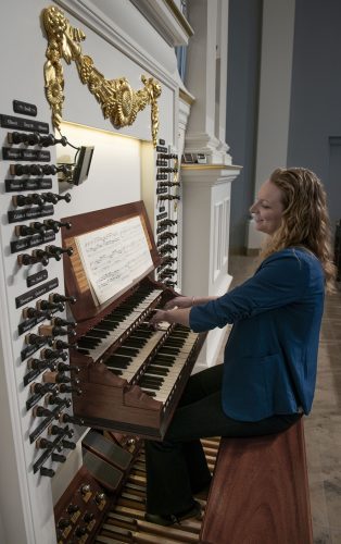 Getting in a little practice time, Elisa Bickers, principal organist and associate director of music ministry at Village Presbyterian Church, plays Felix Mendelssohn's Fourth Sonata for Organ on the Opus 22. Photo by Shane Keyser