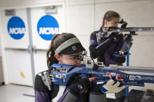 Kristen Hemphill and Rachel Garner aim their rifles during practice. Photo by Rodger Mallison