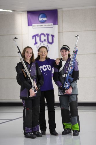 Head Coach Karen Monez, center, with champion shooters Elizabeth Marsh, left, and Kristen Hemphill. Marsh and Hemphill earned 2019 individual national championship titles, Marsh in smallbore and Hemphill in air rifle. Photo by Rodger Mallison