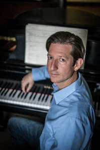 Till MacIvor Meyn, professor of music theory and composition, composed a new tune for the Fort Worth Symphony Orchestra and revamped an American classic. Photo by Olaf Growald