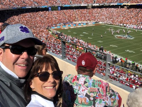 My 25th time at the Texas-OU game was also my wife Linda's first. Isn't that Hawaiian shirt in front of us amazing? Courtesy of John Denton