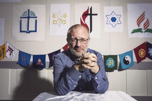 Duane Bidwell is a professor at Claremont School of Theology. The faculty say displaying imagery of religions serves as a reminder that we live in an interreligious world. Photo by Christina Gandolfo