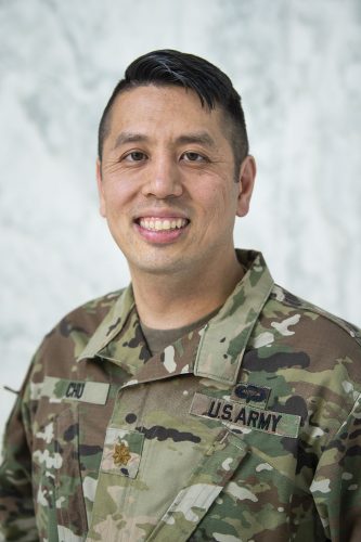 Eugene Chu serves as a U.S. Army Reserve officer; he appears here in his Army Reserve fatigues. Photo by Lisa Helfert