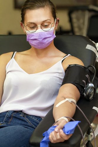 TCU med student Quinn Losefsky having blood drawn during the COVID-19 virus pandemic. The Red Cross blood draw was held at Baylor All Saints Hospital in Fort Worth.