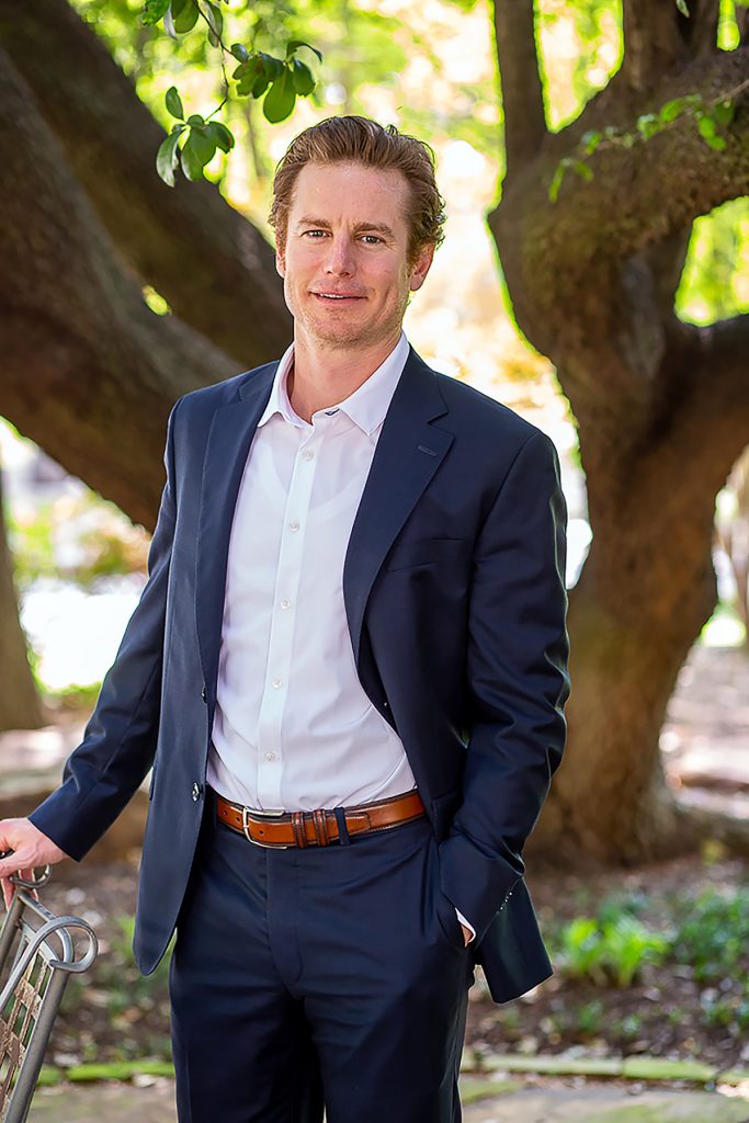 Attorney Chris Hamilton '00 founded Lawyers for America, a nonprofit that offers legal assistance to people whose rights have been violated. Hamilton appears here outside his home in Dallas, TX. Photo by Mark Graham, April 21, 2020