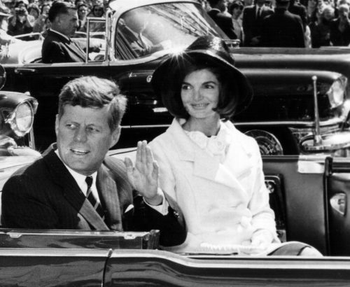 381091 72: The President and Mrs. Kennedy ride in a parade March 27, 1963 in Washington. (Photo by National Archive/Newsmakers)