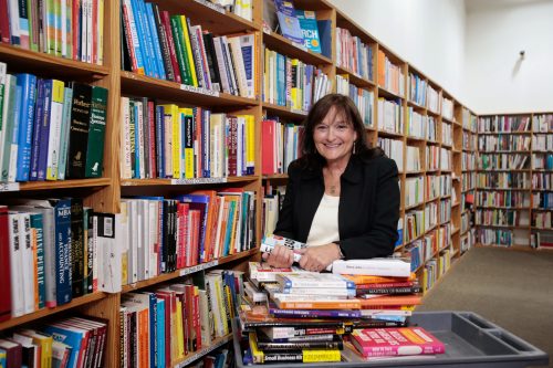Kathy Doyle Thomas, Executive Vice President for Half Price Books, photographed at the flagship store on Northwest Highway in Dallas, TX on July 23, 2020. Photo by Ross Hailey