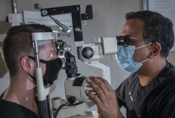 Dr. Sai Chavala, a retina specialist and professor of surgery at the TCU and UNTHSC School of Medicine in Fort Worth, treats patients at an ophthalmology clinic in Dallas, Wednesday July 22, 2020. Photo by Rodger Mallison