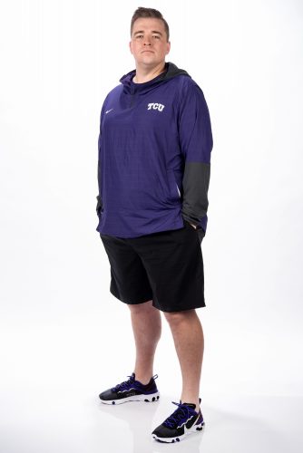 As Senior Assistant Strength & Conditioning Coach for TCU Athletics, Michael Wood ’14 MS (Kinesiology/Harris) trains volleyball, men’s golf, women’s golf, swimming and diving student-athletes. He focuses on nurturing lifelong athletes and works to keep student-athletes moving optimally for their sport. Studio portrait by Glen Ellman, October 5, 2020