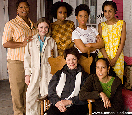 Sue Monk Kidd, front center, and The Secret Life of Bees director Gina Prince-Bythewood pose with the film's stars, left to right, Queen Latifah, Dakota Fanning, Jennifer Hudson, Alicia Keys and Sophie Okonedo. Courtesy of Sue Monk Kidd | Photo by Sidney Baldwin)