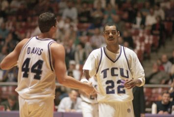 TCU men's basketball vs. Boston University, December 12, 1996: James Penny and Dennis Davis on the court. Photo by Linda Kaye