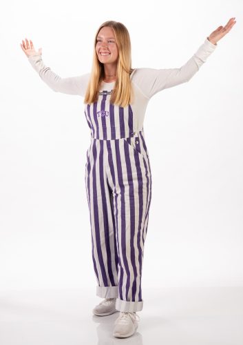 Portrait photo of Maggie Martin, head Dutchman. The Dutchmen, in their purple-and-white-striped overalls, lead the student sections during football and men’s basketball games.. shot in studio on 7/30/21. photos by Glen E. Ellman.