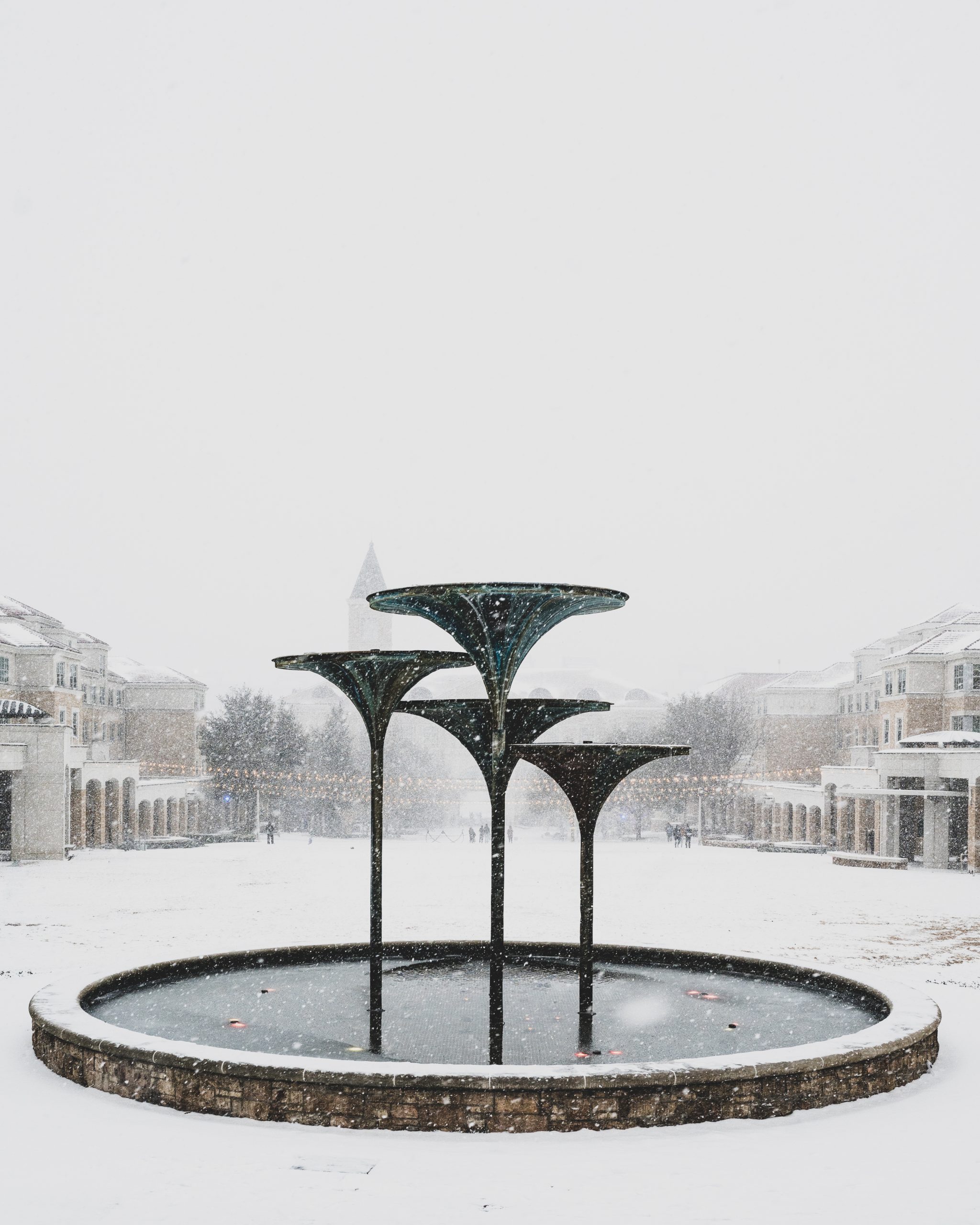 Severe winter weather blanketed the TCU campus in snow, closing the campus for a week of February 15 through 19, 2021. Shown: Frog Fountain. Photo by Eric Sasadeusz (social media intern), February 14, 2021