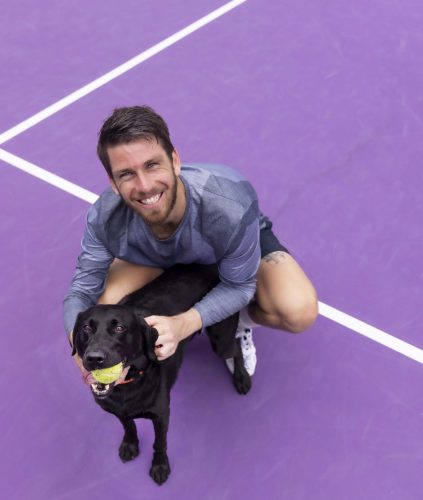 TCU alum, Cameron Norrie, practices on the TCU courts on campus March 4, 2022. When Cam is in Fort Worth he always stays with his Texas “mom” Linda Cappel ’80 who works at the TCU Tennis Shop. Her black lab, Zoe, is also a big fan of Cameron.