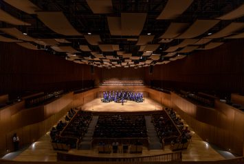 Image from a series of photos of the Ensemble Concert Series: Frog Corps and Friends in the Van Cliburn Concert Hall at TCU. Features TCU Frog Corps, Flower Mounds HS Con Brio, Mansfield HS Tenor-Bass Choir, and North Mesquite HS Tenor-Bass Choir. Photo by James Anger, April 6, 2022