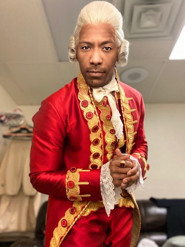 John Devereaux '12 plays different roles in different performances during the hit Broadway musical Hamilton's national tour. He appears here in costume as King George III. Photo courtesy of John Devereaux