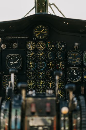 Cockpit of airplane, multiple dials and gauges.