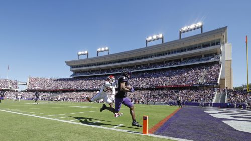 TCU receiver Taye Barber (4) scores a touchdown in the first quarter of the Frogs' decisive 55-24 win over the Sooners. Courtesy of TCU Athletics | Ellman Photography