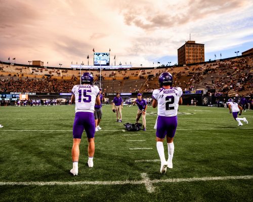 TCU quarterbacks Max Duggan and Chandler Morris warm up before the Frogs' season-opening game in Boulder, Colorado. Morris won the starting job but was injured in the third quarter of the game. Duggan took over and went on to become the 2022 Heisman Trophy runner-up. Courtesy of TCU Football
