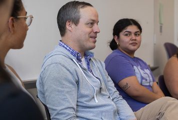 people sitting in a classroom setting