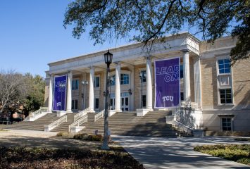 Photograph of the front steps and entrance of TCU's Mary Couts Burnett Library on a sunny afternoon.