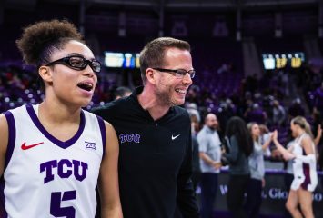 TCU student-athlete Olivia Miles and head coach Mark Campbell smiling as they walk across the court at Schollmaier Arena, Texas Christian University, Fort Worth, Texas.