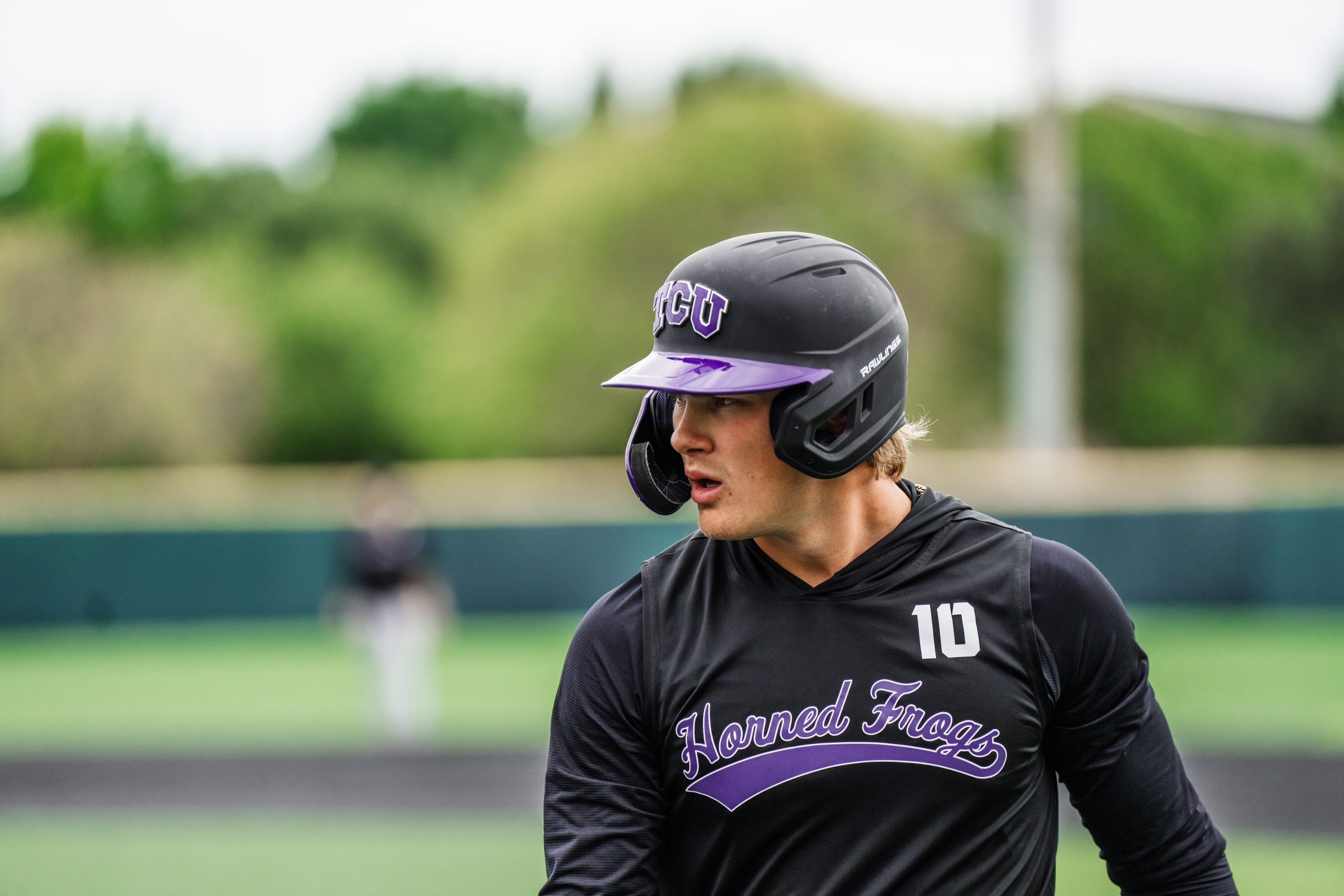 TCU outfielder Sawyer Strosnider walks the field during warmups ahead of a road game at Abilene Christian.